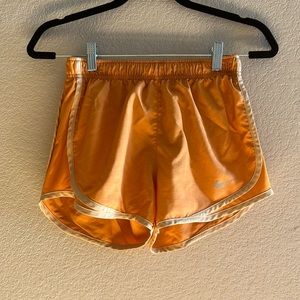 Women’s Orange Nike dri-fit running shorts